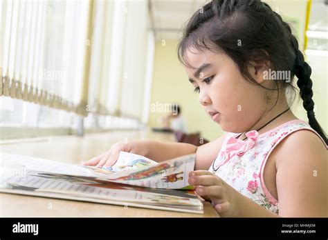 The Children Are Reading Books In The Libraryreading Is The Best Way