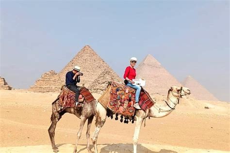 Camel Ride Around The Great Pyramids Of Giza