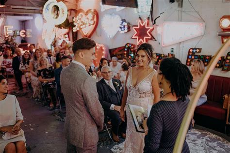 Gods Own Junkyard Wedding With Neon Signs & Lace Wedding Dress