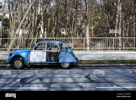 A CitroÃn 2cv Is Parked On Road On Bridge Munich Germany Stock Photo