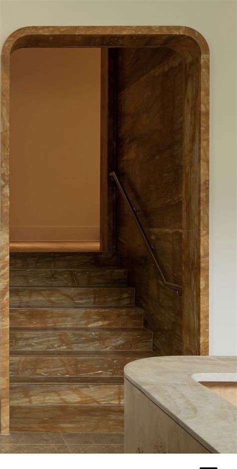 The Stairs Are Made Of Marble And Wood