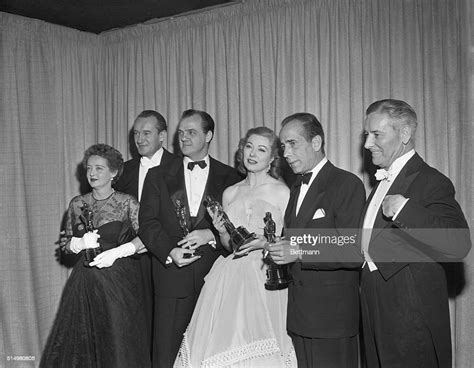 Celebrities Pose With Their Oscars After The 1951 Academy Awards