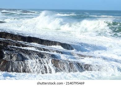 Atlantic Ocean Waves Crashing Into Rocks Stock Photo