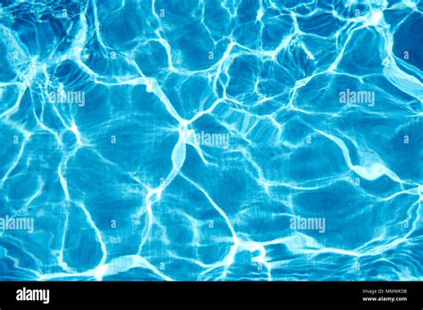 Reflecting water ripple texture in a swimming pool Stock Photo - Alamy