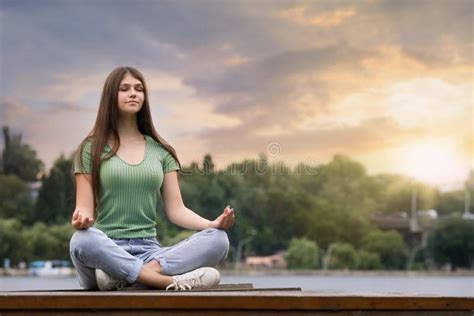 Teenage Girl Meditating Near Rive Stock Image Image Of Caucasian