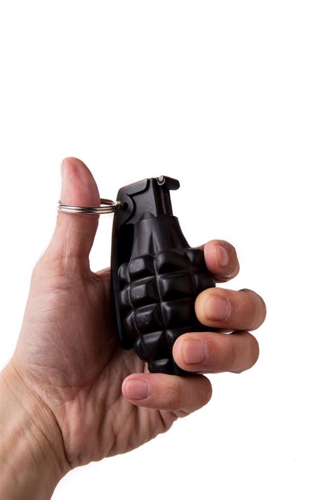 Hand Holding A Grenade Free Stock Photo - Public Domain Pictures