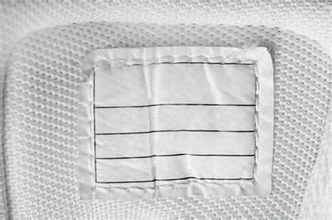 premium photo empty paper patch stitched  white textile background