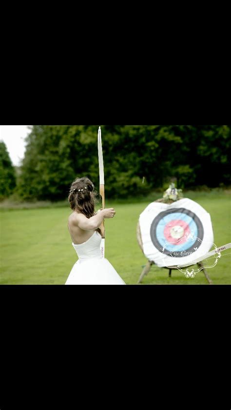 Bride Playing Archery Tipi Festival Wedding Games With Independent