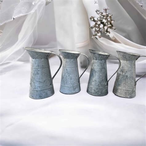 Rustic Metal Jugs Estrel Wedding And Event Hire