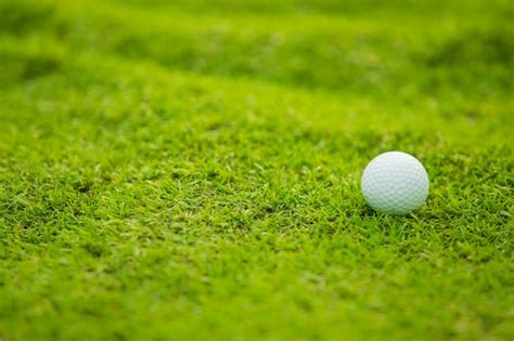 Premium Photo Green Grass With Golf Ball