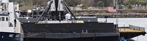 Spacex Falcon 9 Booster Sails Into Port After Historic Third Launch And