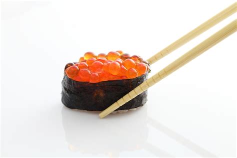 Premium Photo Salmon Egg On Sushi Nigiri Roll