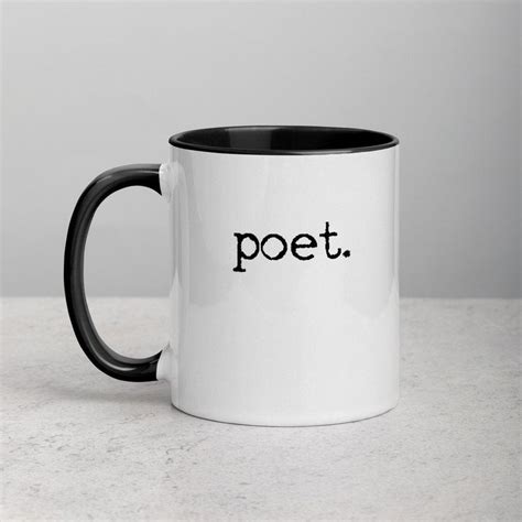 A Black And White Coffee Mug With The Word Poet On It S Side