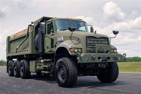 Mack Defense Presents First Production M917a3 Heavy Dump Trucks To Us