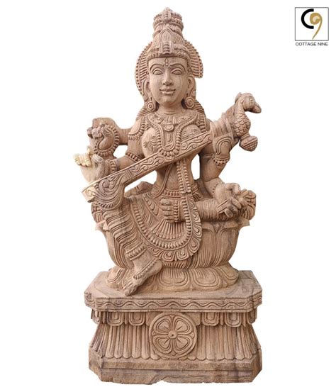 South Indian Style Four Armed Idol Of Devi Saraswati Carved In Wood