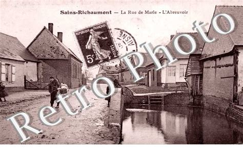 Reproduction Cartes Postales Anciennes La Rue De La Mairie L Abreuvoir