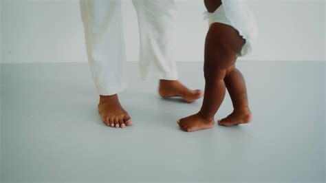 Naked Chubby Baby Legs Next To Mom S Legs Stock Footage Sbv