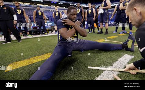 Alabama Offensive Lineman Cam Robinson Is Measured For Flexibility At