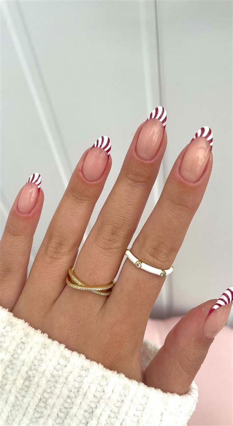 50 Best Holiday Nail Art Ideas And Designs Candy Cane Tips