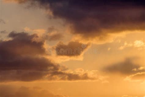 Colorful Sunset with Fluffy Clouds in the Sky Stock Photo - Image of ...