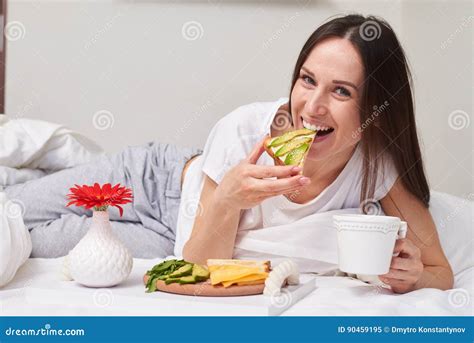 Brunette Tasting Sandwich With Avocado Stock Image Image Of Snack Lifestyle 90459195