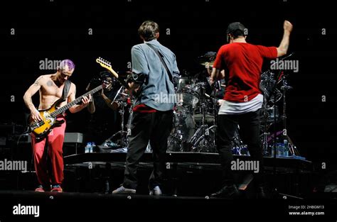Flea And Anthony Kiedis Of The Red Hot Chili Peppers Performs At The O Arena In London Stock