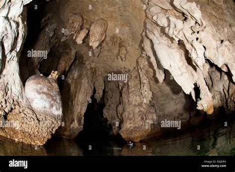 Snorkeller Explores The Spectacular Tomolol Caves Southern Raja Ampat