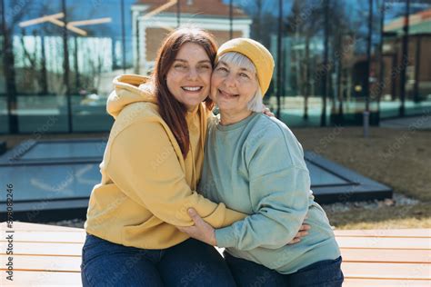 Happy Friends Holding Each Other Happy Loving Older Mature Mother And Grown Millennial Daughter