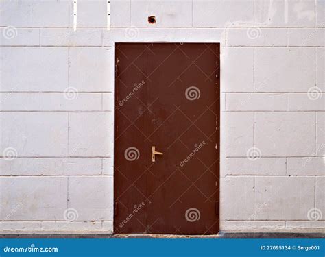 Rusty Metal Door In Beige Block Wall Stock Photo Image Of Brown