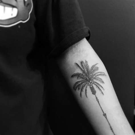 Palm Tree Tattoo Located On The Inner Forearm