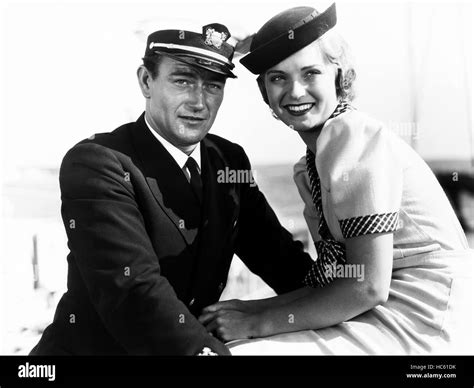 The Sea Spoilers From Left John Wayne Nan Grey 1936 Stock Photo Alamy