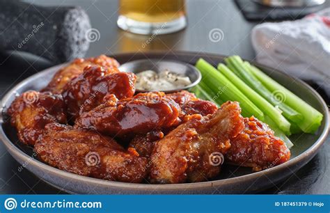 Boneless Chicken Wings Covered In Honey Garlic Bbq Sauce With Ranch And