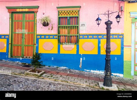 Colorful decorated houses in Guatape village, Colombia Stock Photo - Alamy