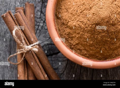 Cinnamon Sticks And Cinnamon Powder On Rustic Background Healthy Spice