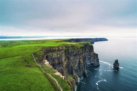 Aerial view of the scenic Cliffs of Moher in Ireland Photograph by Miroslav Liska - Pixels