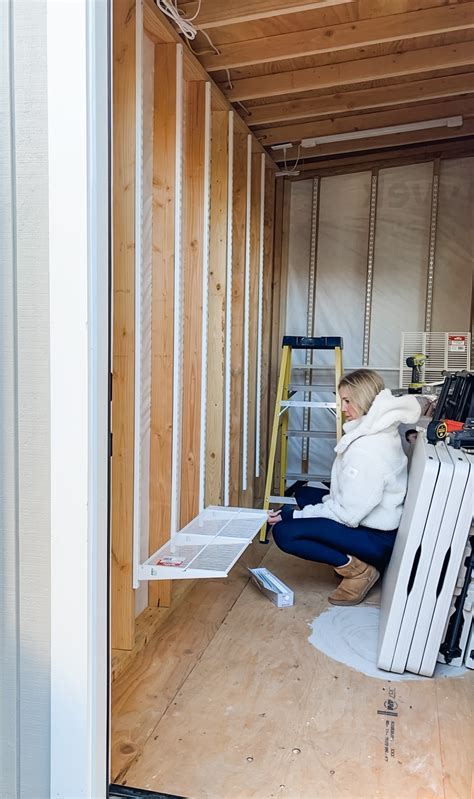 Elfa Shelving In A Shed Without Drywall Simply Organized