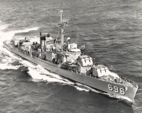 An Old Photo Of A Ship In The Ocean With Lots Of People On It S Back