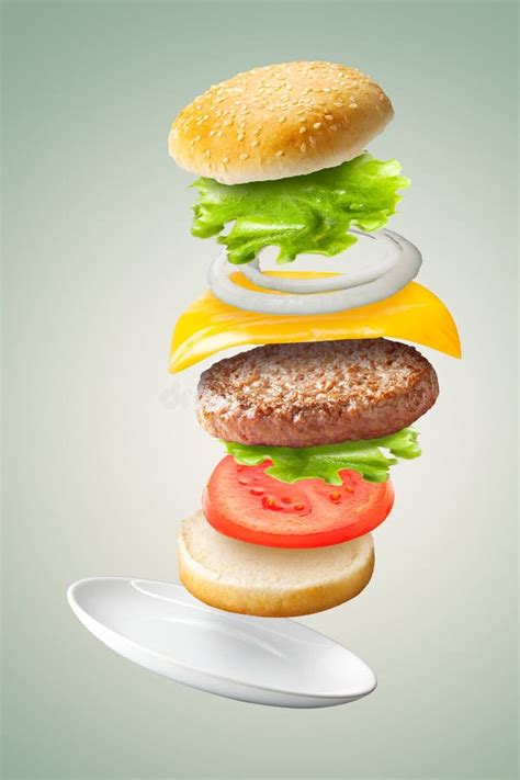 Flying Classic Hamburger On Green Background Stock Photo Image Of