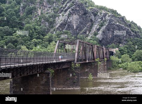 Harpers Ferry West Virginia A Bridge Crossing The Potomac With The Old Csx Railway Tracks In