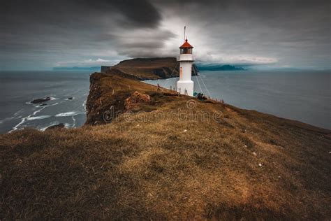 Lighthouse in Mykines Faroe Stock Photo - Image of background, island ...