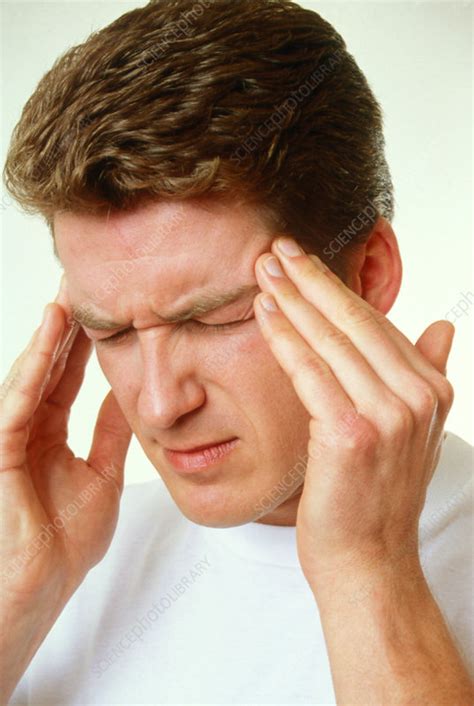 Man Holding His Head Suffering From A Headache Stock Image M382