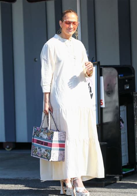 Jennifer Lopez In Gucci Heels Paired With A Christian Dior Purse