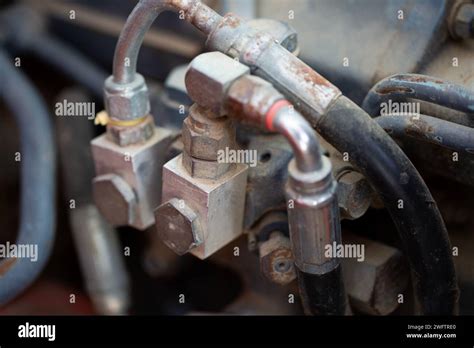 Closeup of parts of a farm tractor Stock Photo - Alamy