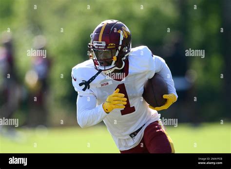 Washington Commanders Wide Receiver Jahan Dotson In Action During