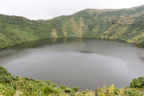 Bisoke crater lake. Rwanda: Mount Bisoke, also Visoke, is an extinct ...