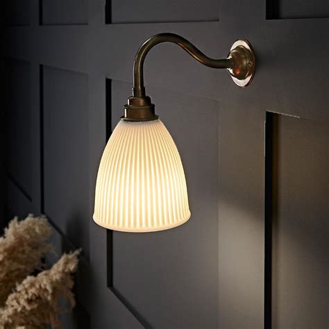 Hartlip Swan Neck Brass And Ceramic Wall Light The Wall Lighting Company