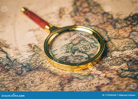 Magnifying Glass On A Vintage World Map Stock Image Image Of Flatlay