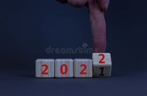 Happy New Year Symbol Businessman Turns A Cube Symbolize The