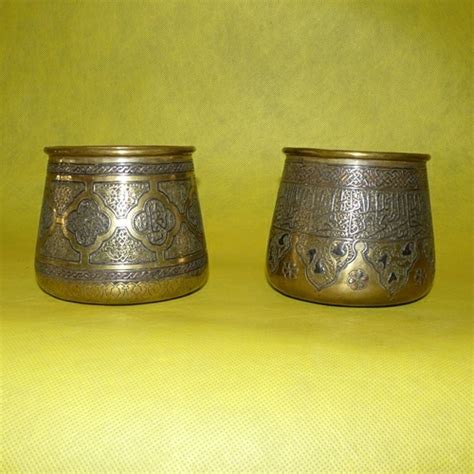 Capital Antiques And Fine Art A Pair Of 19th Century Engraved Brass And Silver Inlaid Vessels