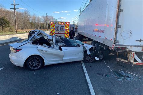 Tesla Destroyed After Sliding Under Truck On Route 1